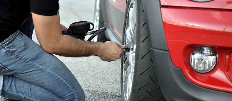 checking tyre pressure