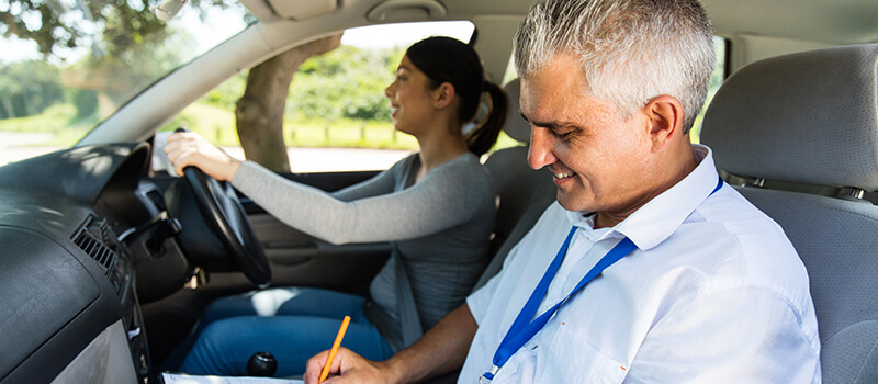 driving instructor with pupil